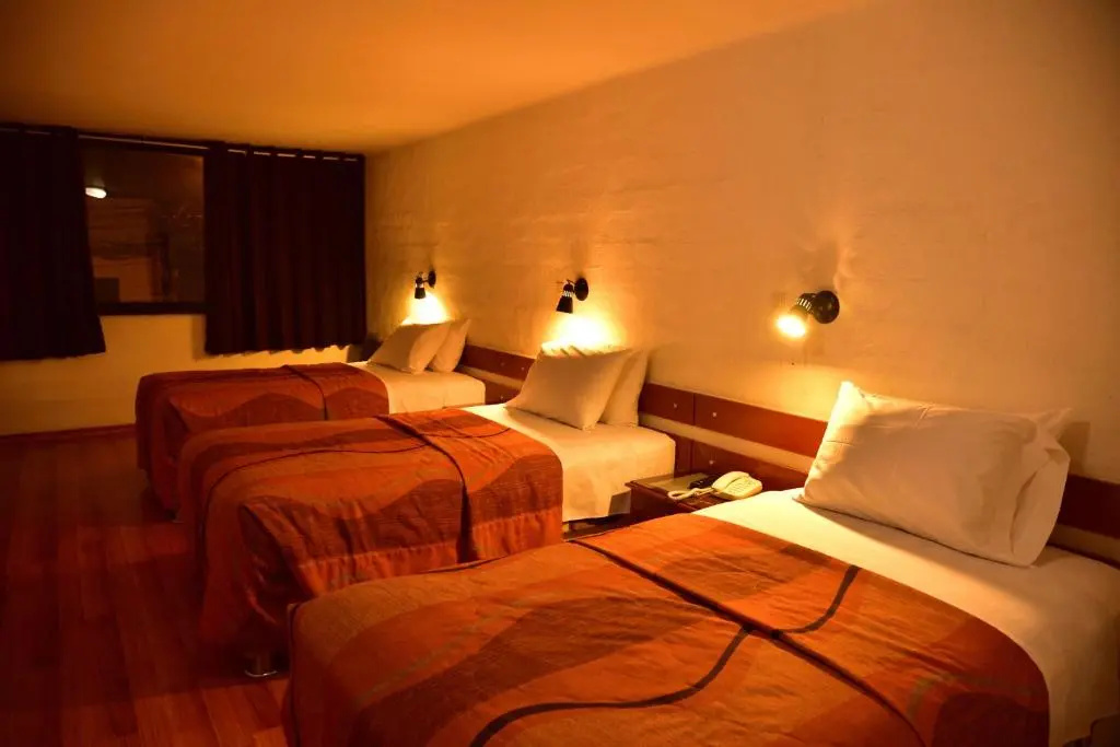 Hotel Holiday Suites - Chambres