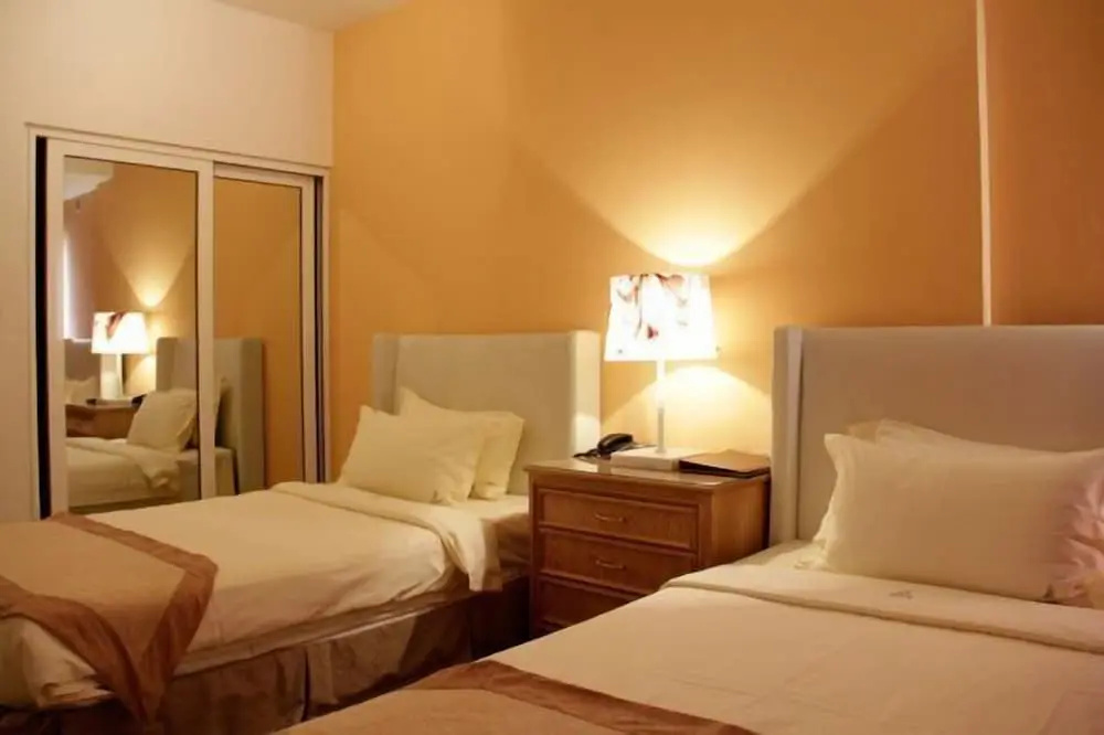 Hotel Ritz Sumbe - Chambres