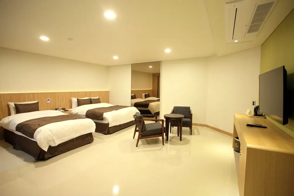 K Tourist Hotel - Chambres