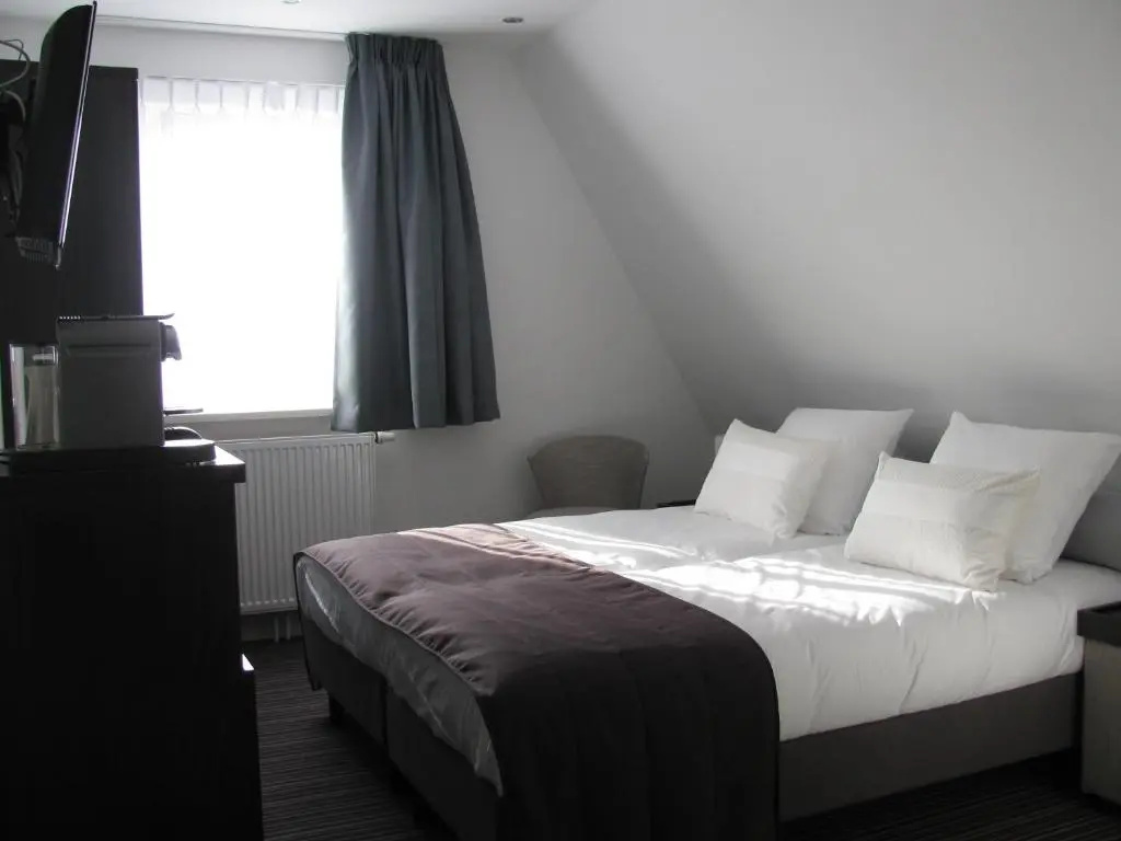 Boutique Hotel de Zwaluw - Chambres