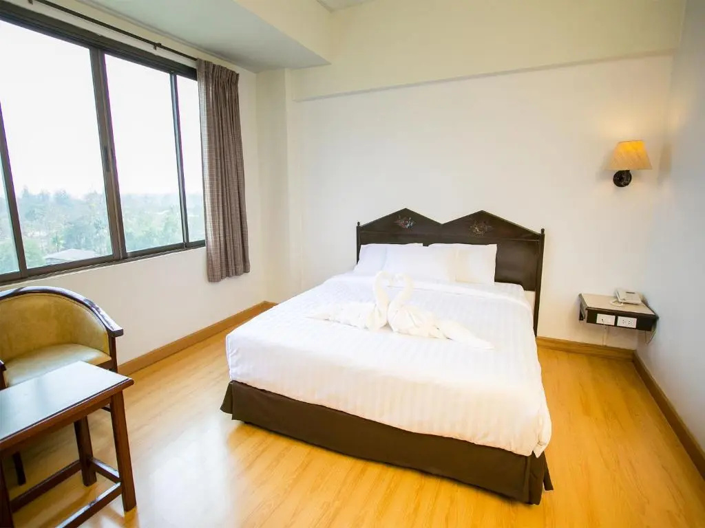 Phrae Nakara Hotel - Chambres