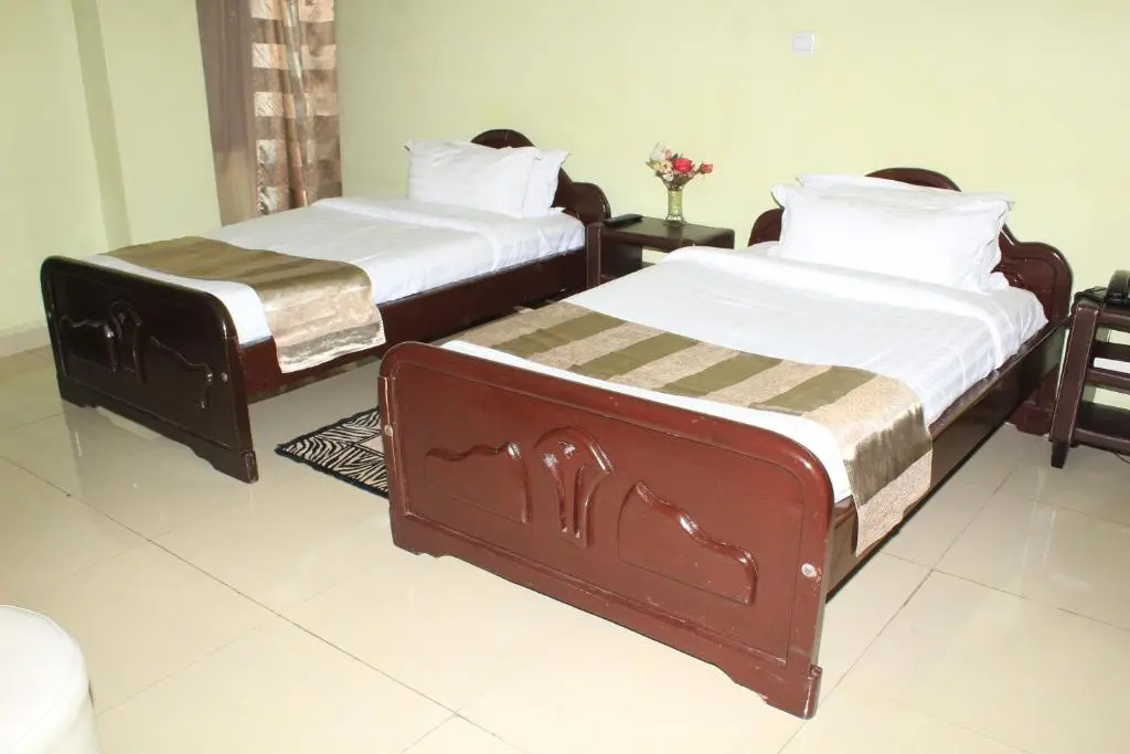 The Legacy Hotel & Suites - Chambres