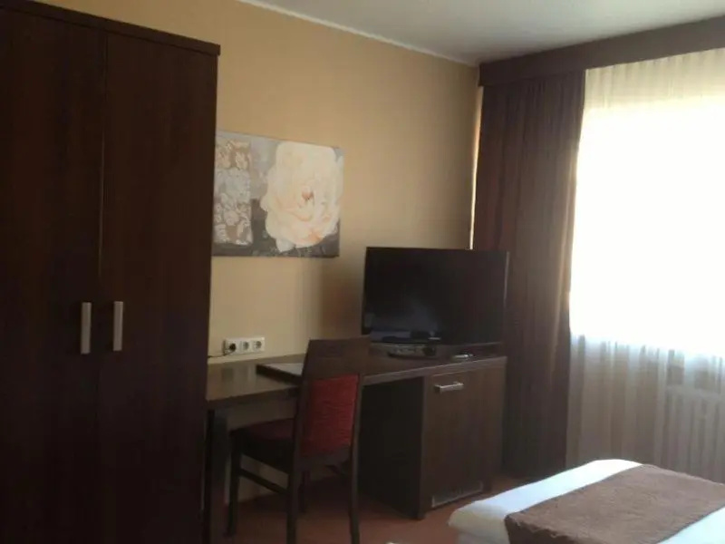 Hotel Mondial - Chambres