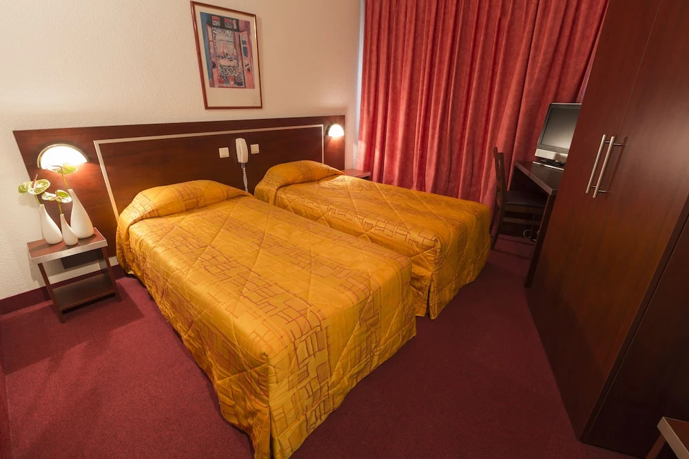 America Hotel Lourdes - Chambres