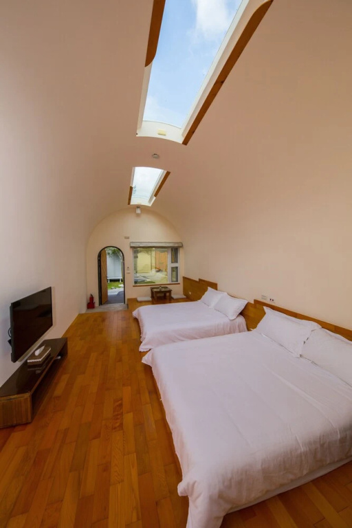 Standard Quadruple room with courtyard view