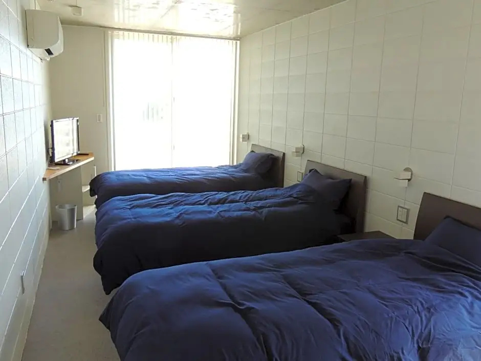 Standard Triple room with sea view