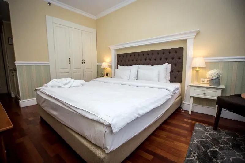 Queen's Court Hotel & Residence - Chambres