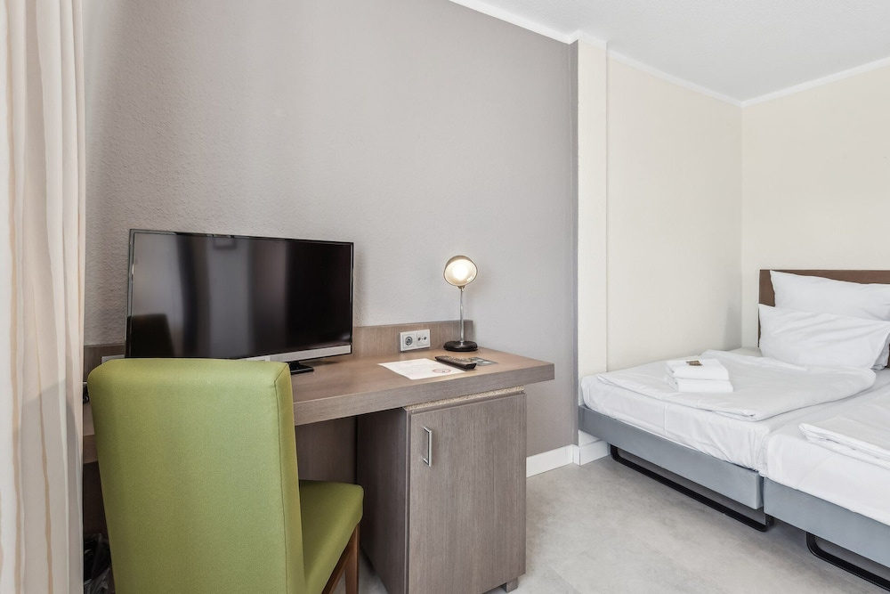 Cityhotel Amadeus - Chambres