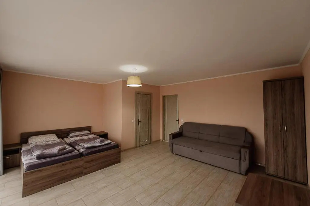 Deluxe Quadruple room with balcony