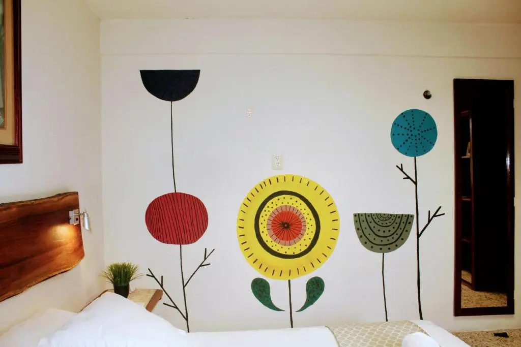 Hostal & Suites Pata de Perro - Chambres
