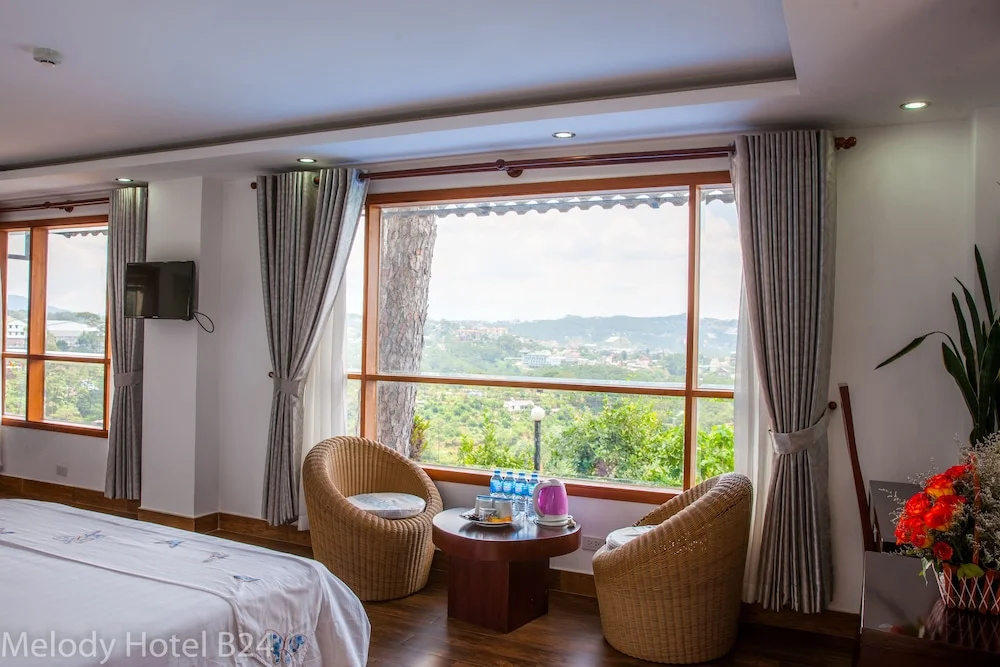 Melody Hotel - Chambres