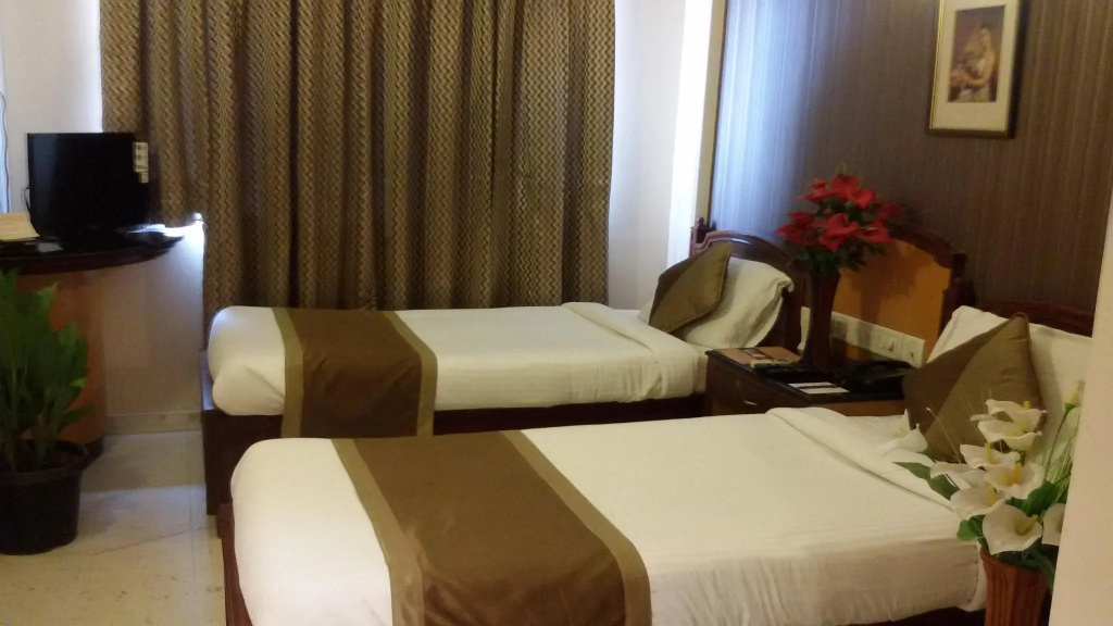 Raaj Residency - Chambres