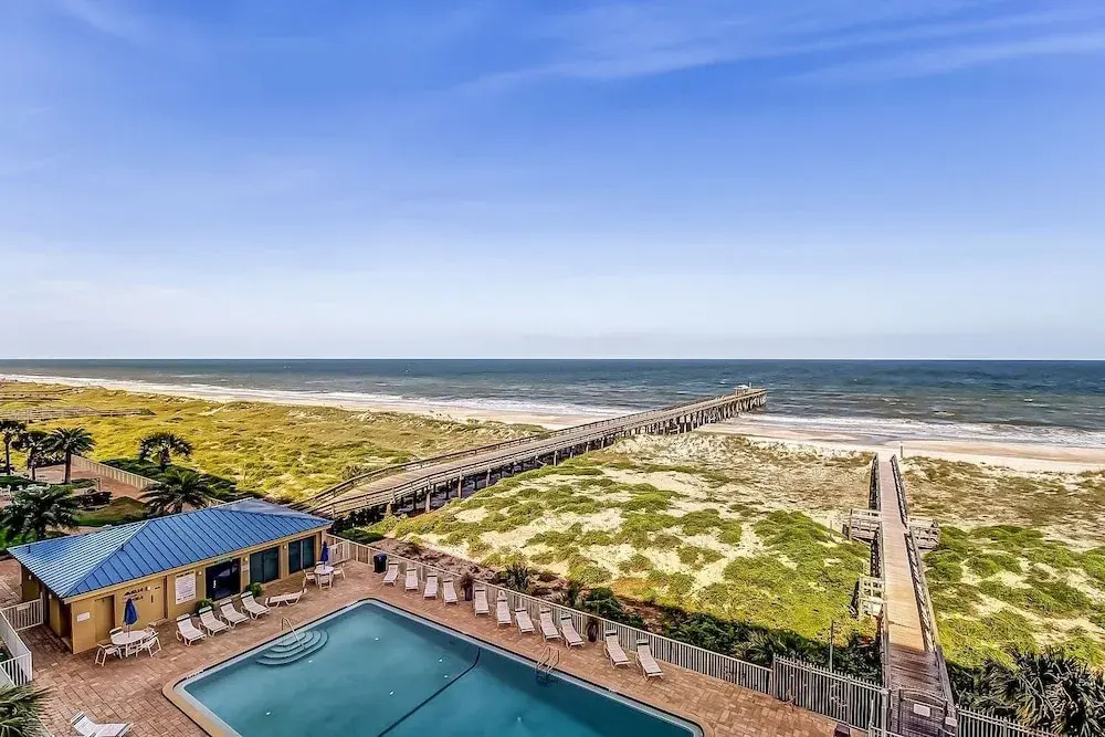 Beachfront Family Condo w/ Pool, Fishing, and Pier Access Amelia by the Sea