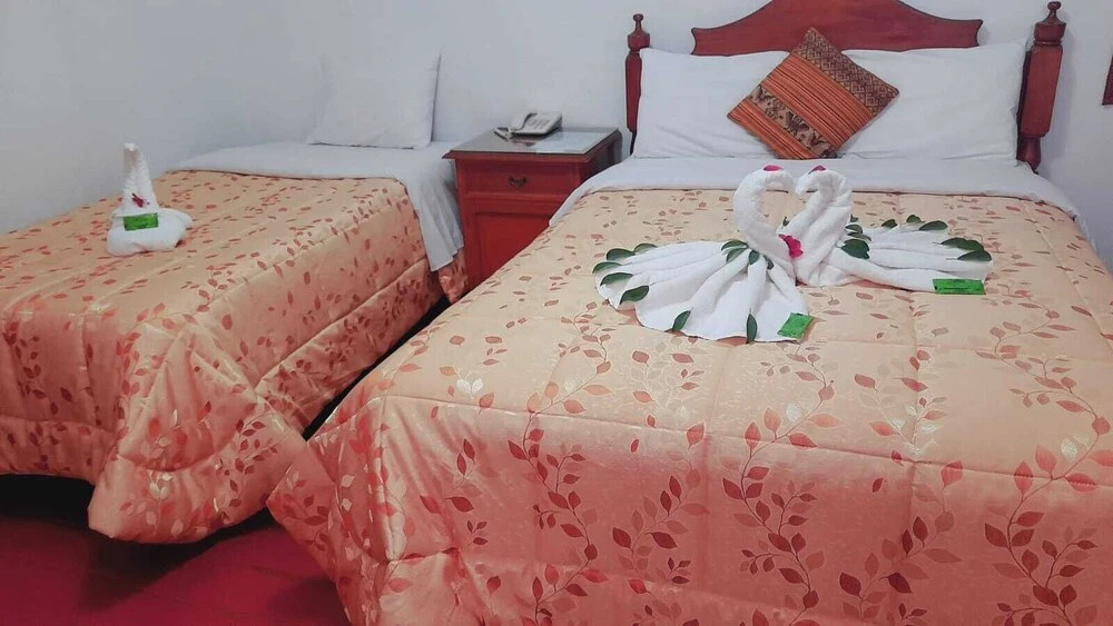 Standard Triple room with courtyard view