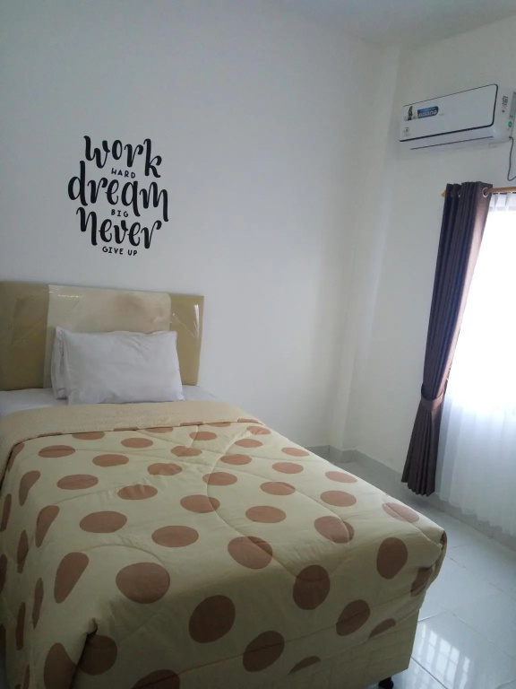 Belitong Inn - Chambres