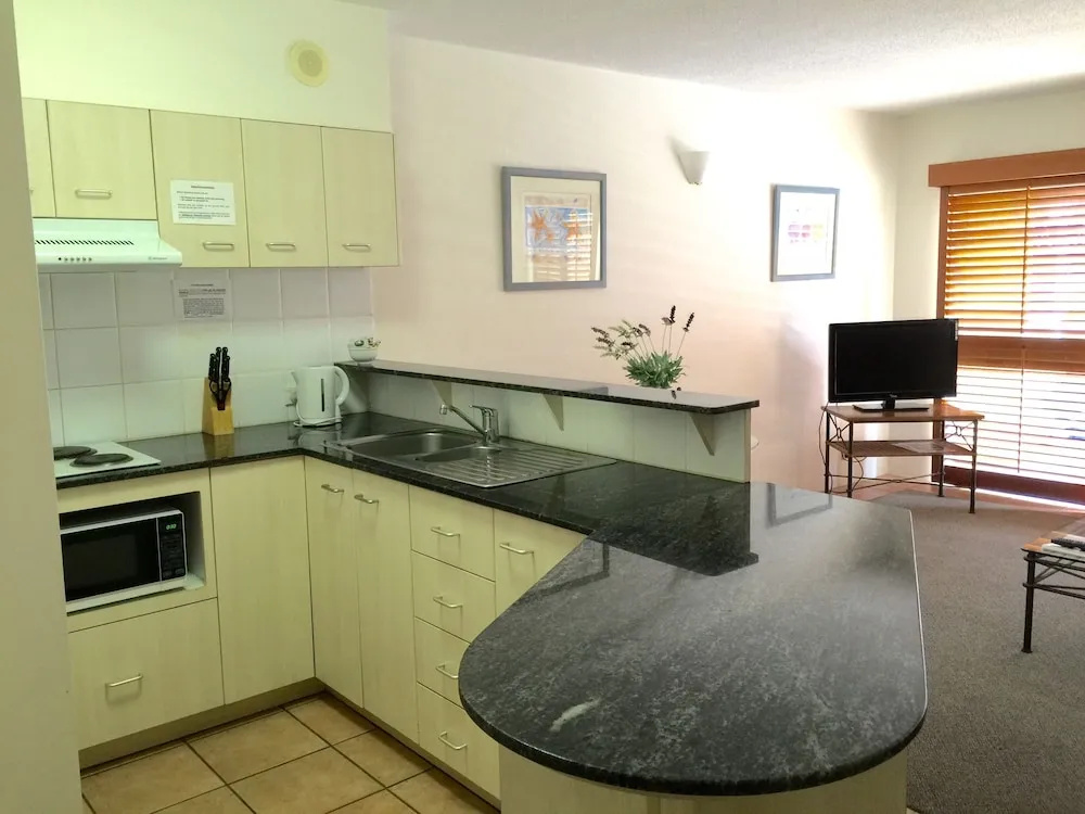 Inn Cairns Boutique Apartments - Chambres