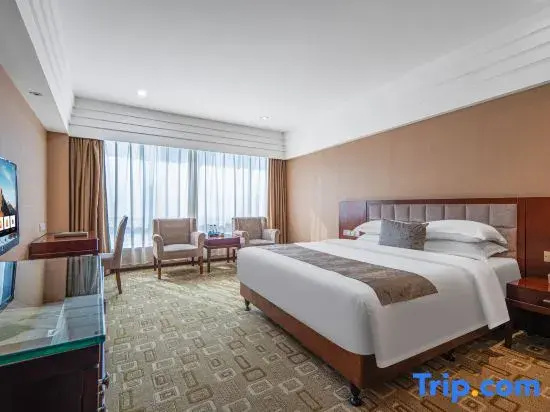 Xinli Hotel - Chambres