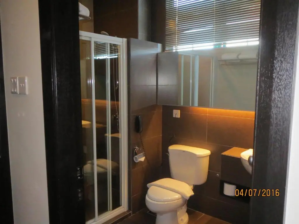 Tat Place Hotel - Chambres