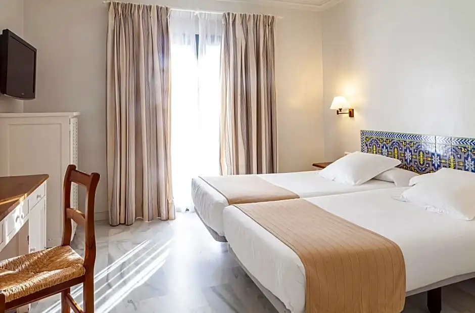 Playa De La Luz Hotel - Chambres
