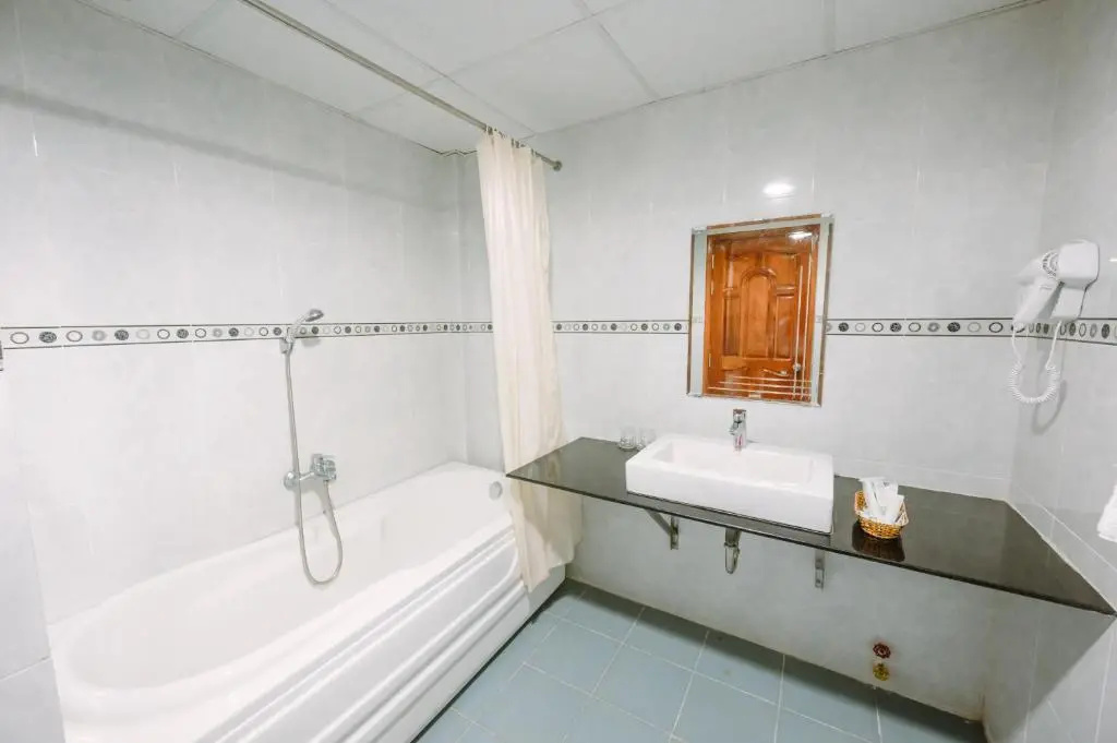 Hoang Duc Hotel - Chambres