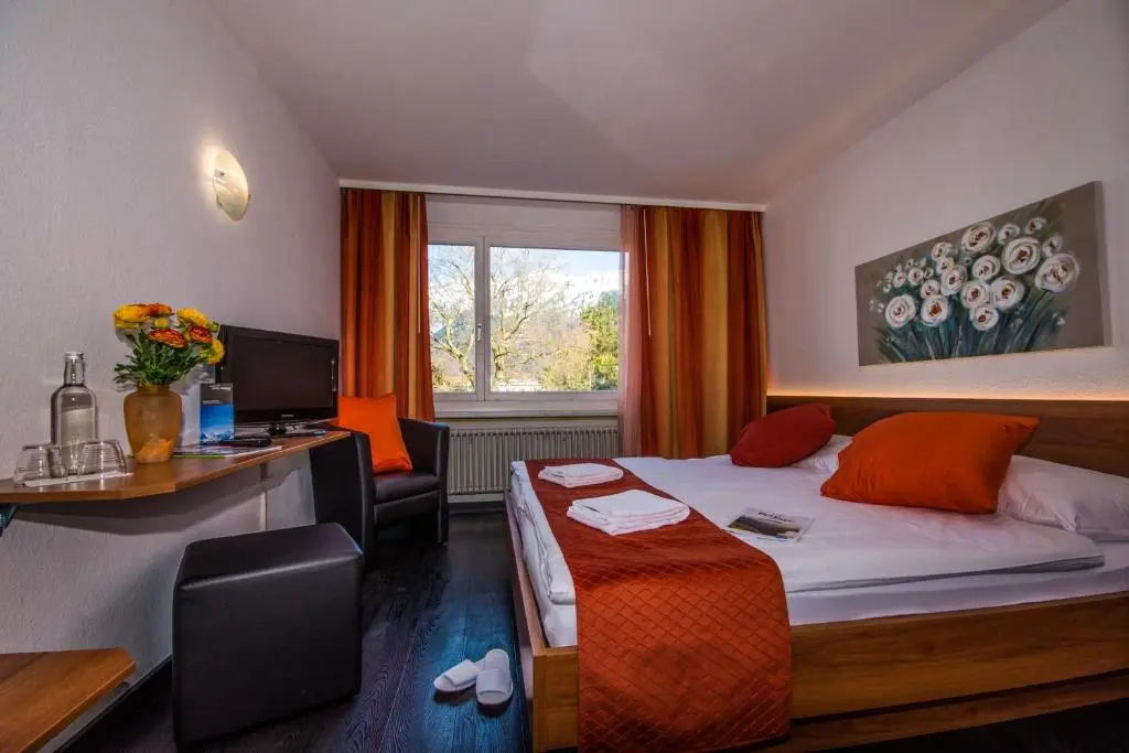 Hotel Merkur Interlaken - Chambres