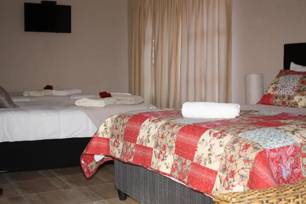 Cura Lodge - Chambres