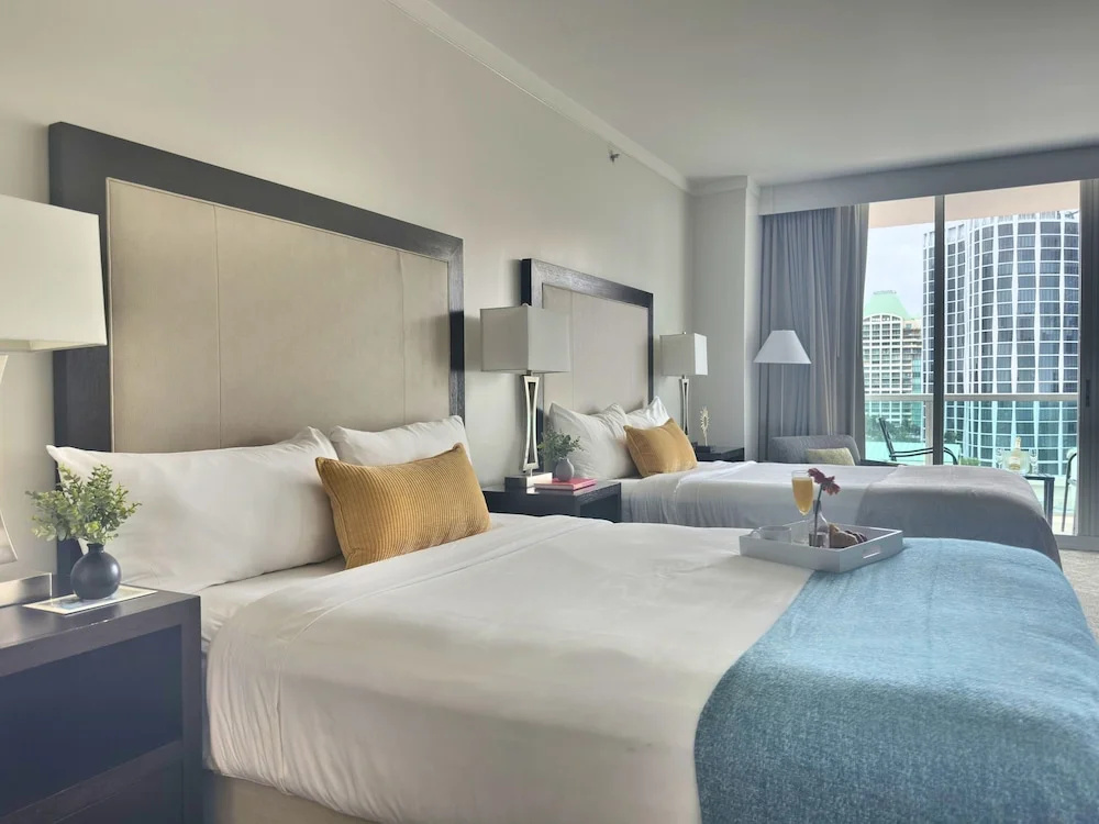 Deluxe Quadruple Studio with balcony and with partial ocean view