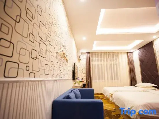 Huatian Hotel - Chambres