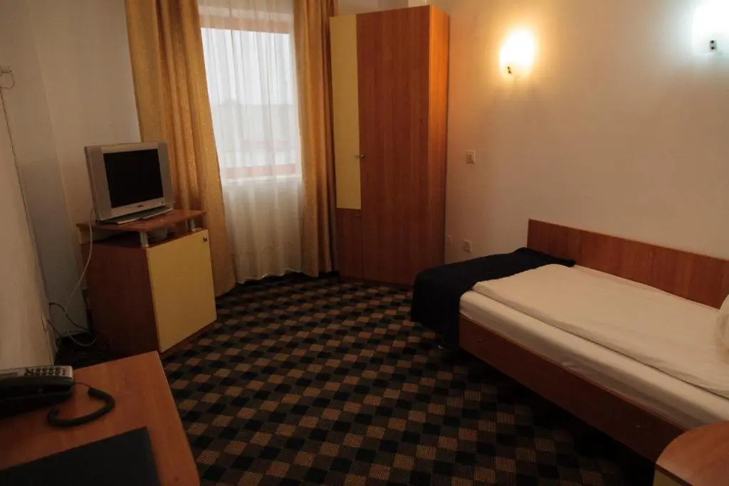 Plus Hotel - Chambres