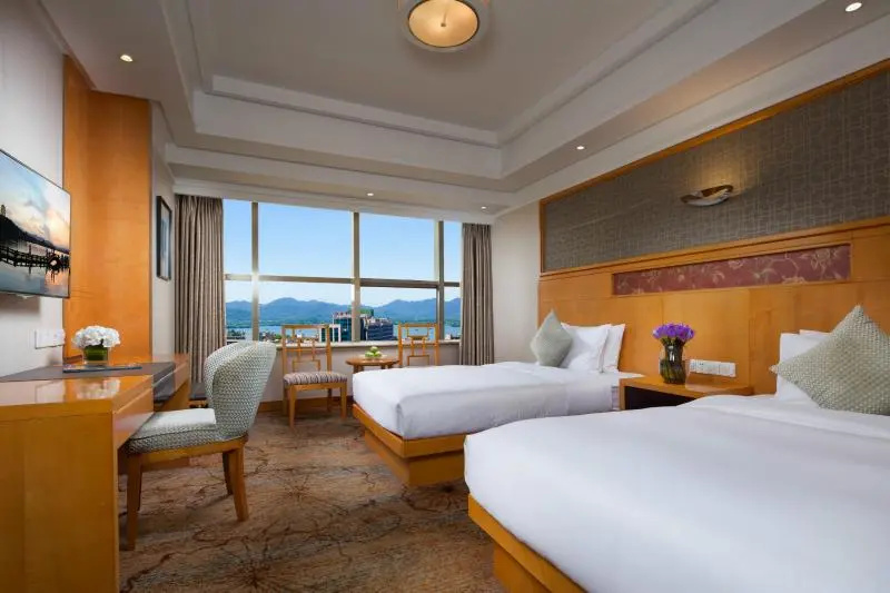 Huachen International Hotel - Chambres