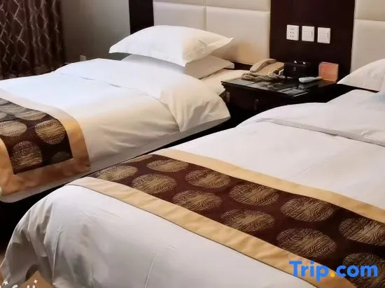 Fuhua Hotel - Chambres