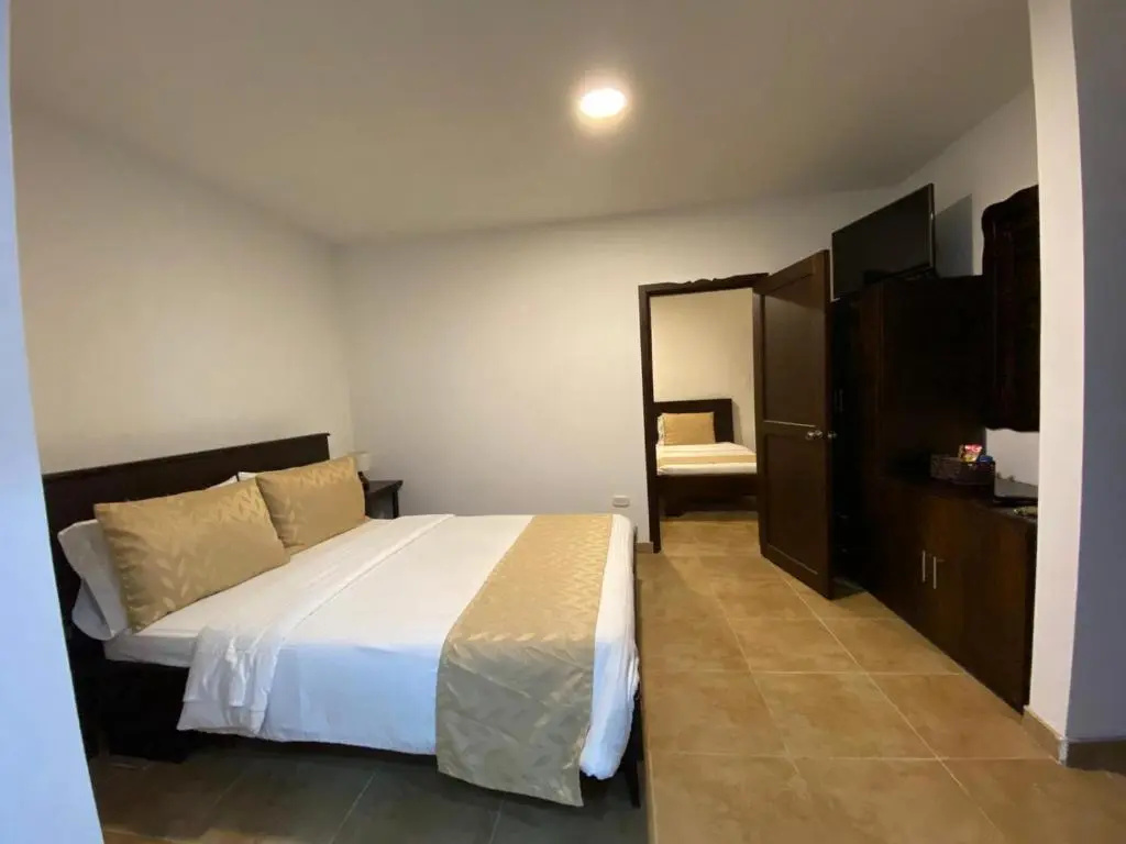 Casa Hotel Las Orquideas - Chambres
