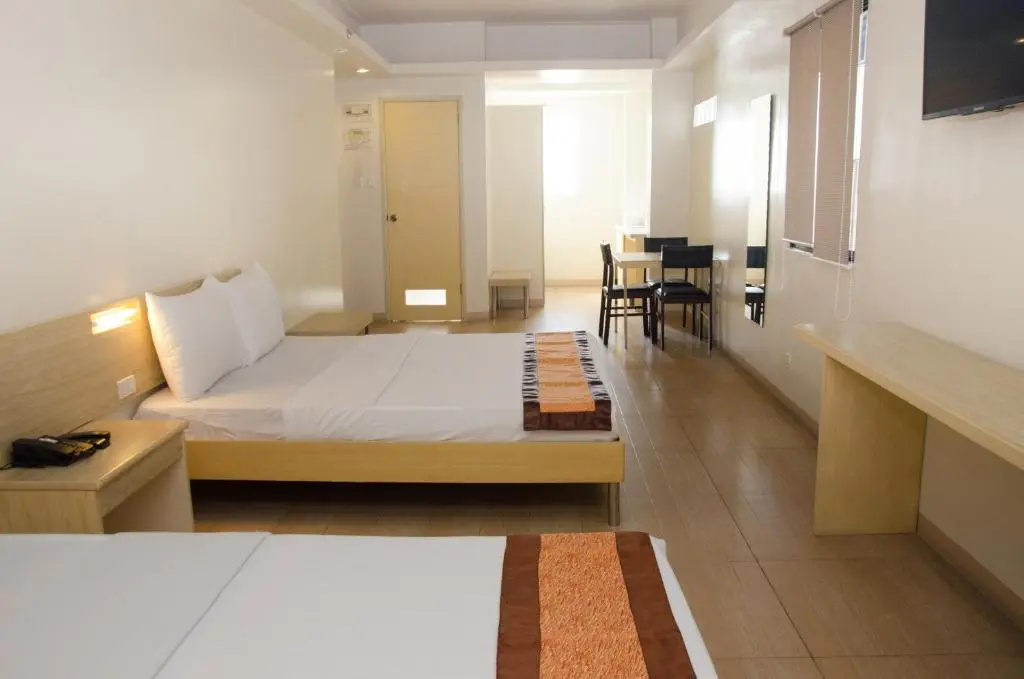 M Suites Hotel - Chambres