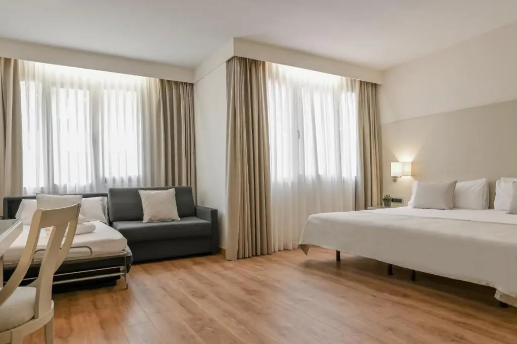 Aparthotel Mariano Cubi - Chambres