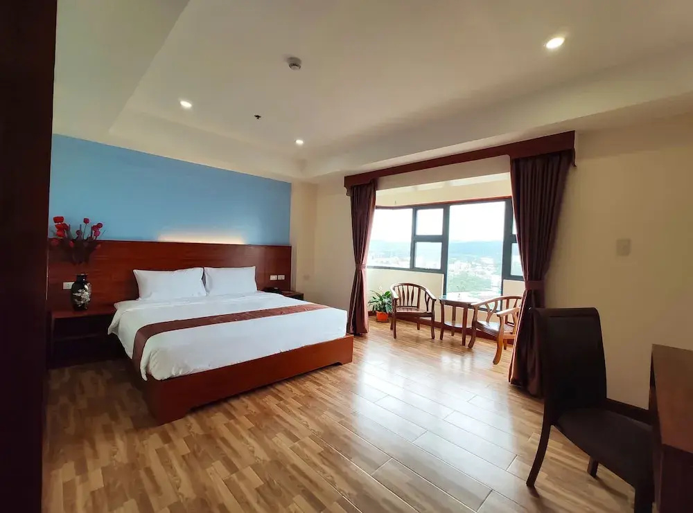 Comfort room with balcony and with city view