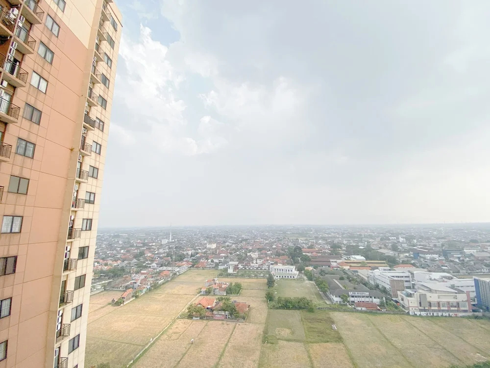 The Cozy Abode 2BR Apartment at Tamansari Panoramic