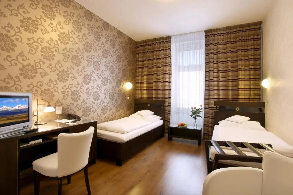 Hotel Trinity - Chambres