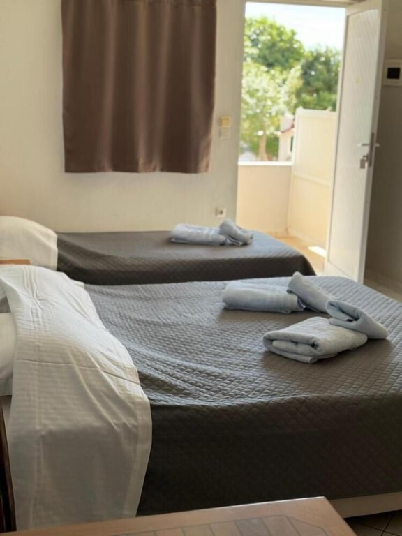 Standard Triple room with balcony and with garden view