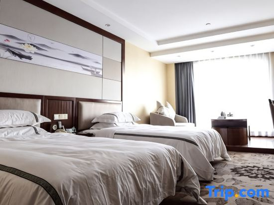 Xinxing Jingming Hotel - Chambres