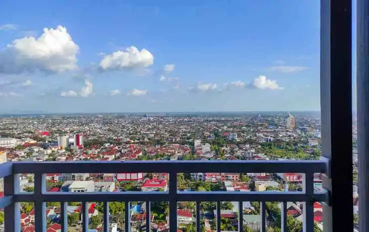 Comfy and Homey 2BR at Vida View Apartment By Travelio