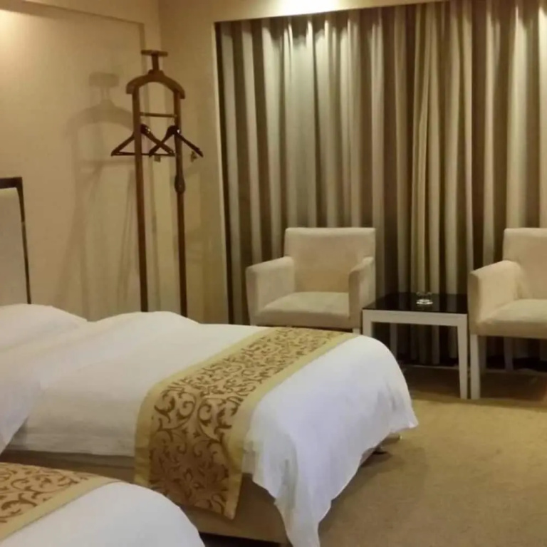 Junyue Hotel - Chambres