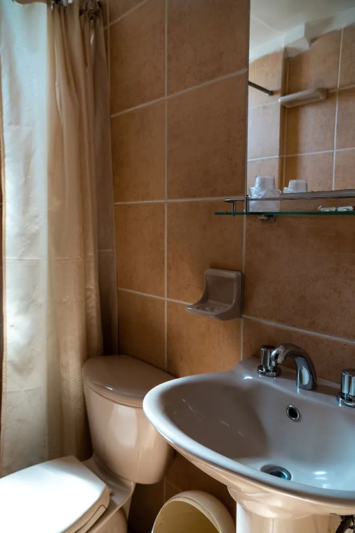 Tonito Hotel - Chambres