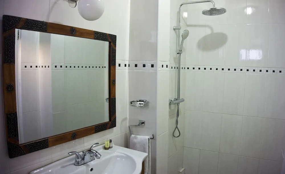 Tropical Enclave Hotel - Chambres