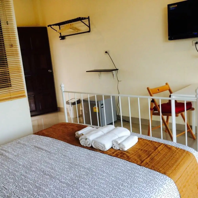 Montra Nakhon Guesthouse - Chambres