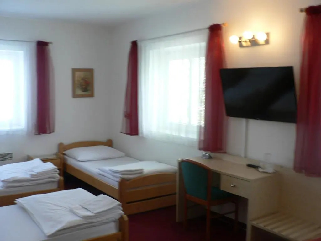 Pension Miltom - Chambres