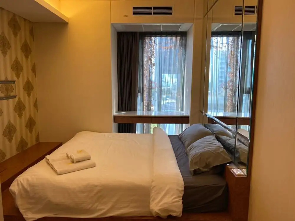 Четырёхместный номер Deluxe с балконом в BoonRumpa Condotel