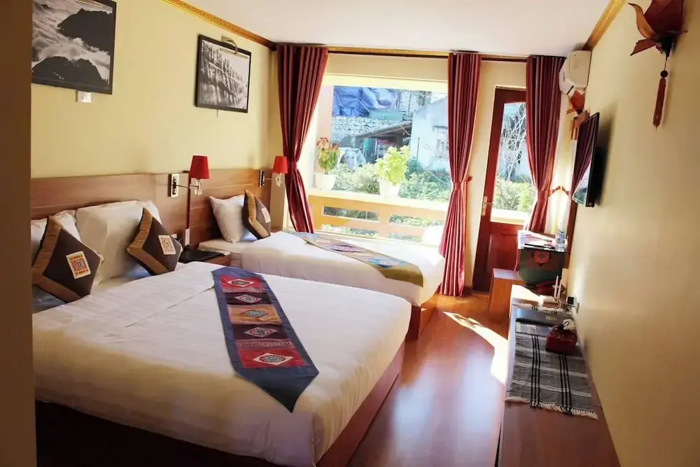 Deluxe Triple room with garden view