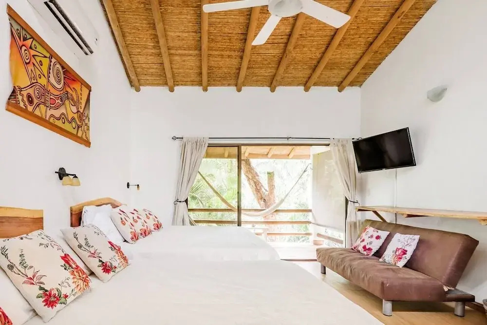 Deluxe Quadruple room with balcony