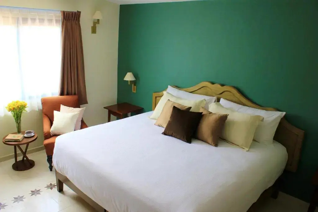 Entre Patios Hotel Boutique - Chambres