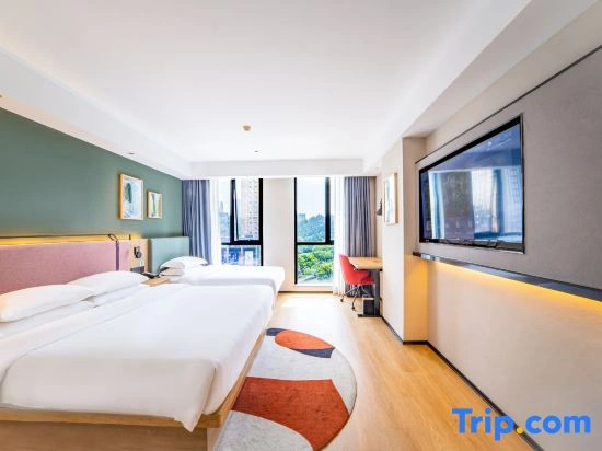 Huatong Hotel - Chambres
